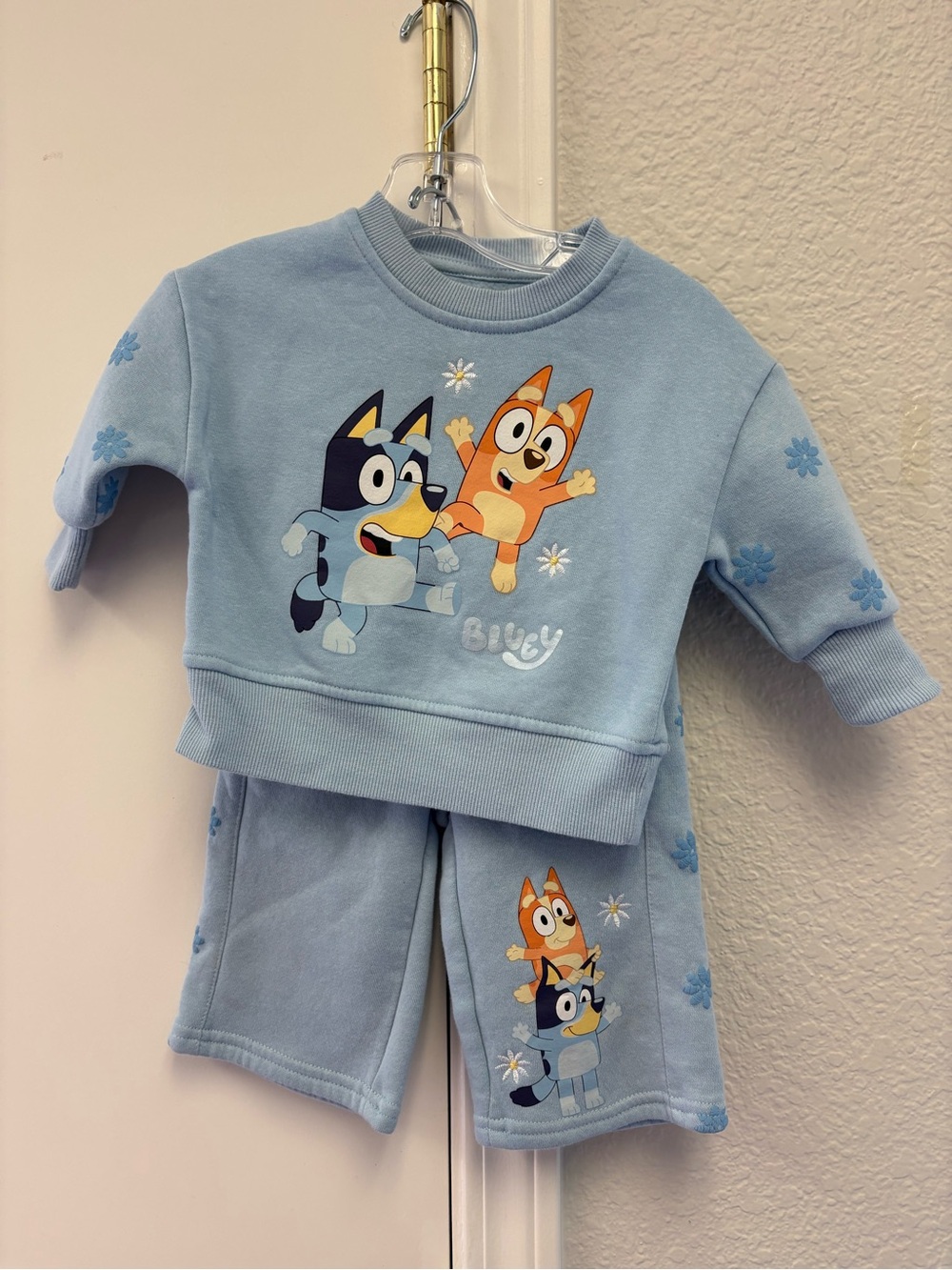 Light Blue Kids Pajama Set with Playful Cartoon Characters